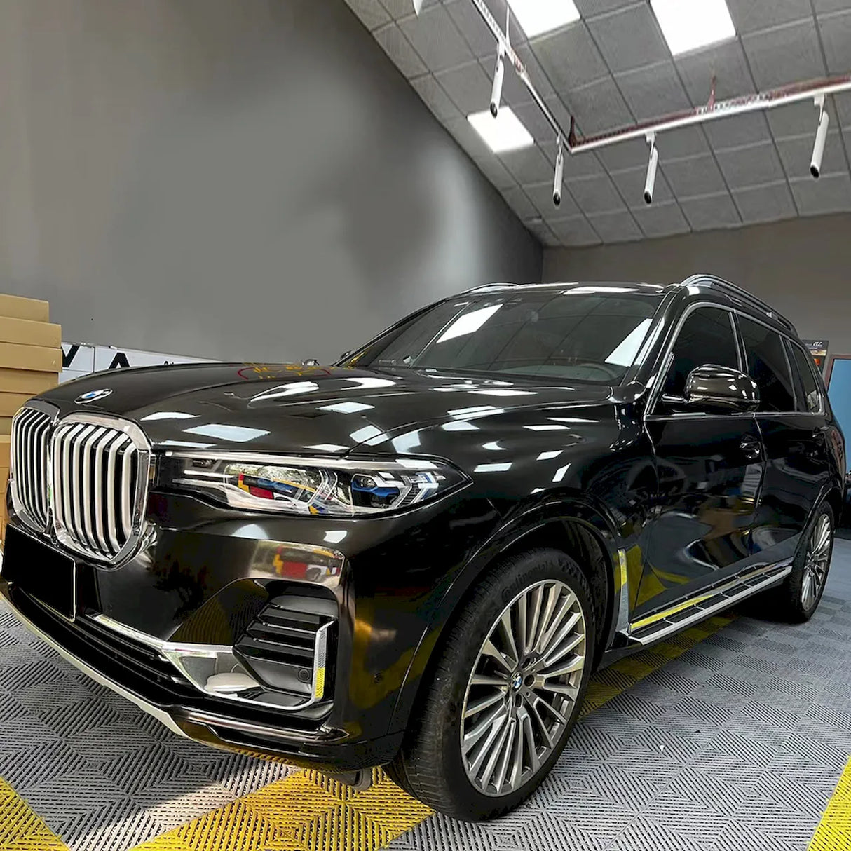 car wrapped in metallic black gold car wrap