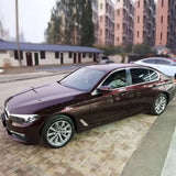 car wrapped in metallic black rose car wrap