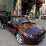 sedan wrapped in metallic black rose car wrap