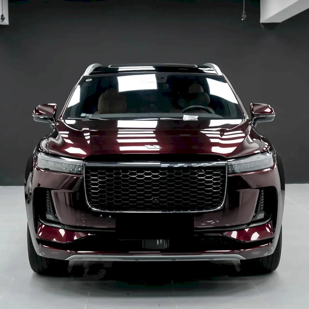 small size suv wrapped in metallic black rose vinyl car wrap