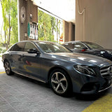 metallic byron bay blue vinyl car wrap installed on a sedan