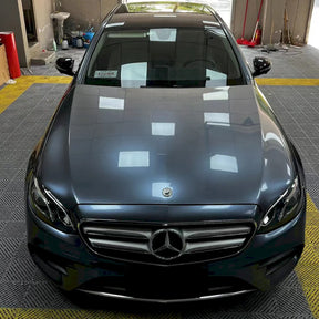 luxury car is being wrapped in metallic byron bay blue wrap