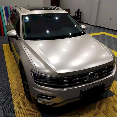 metallic champaign dark gold vinyl wrap on a suv