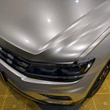 metallic champaign dark gold car wrap installed on a vehicle