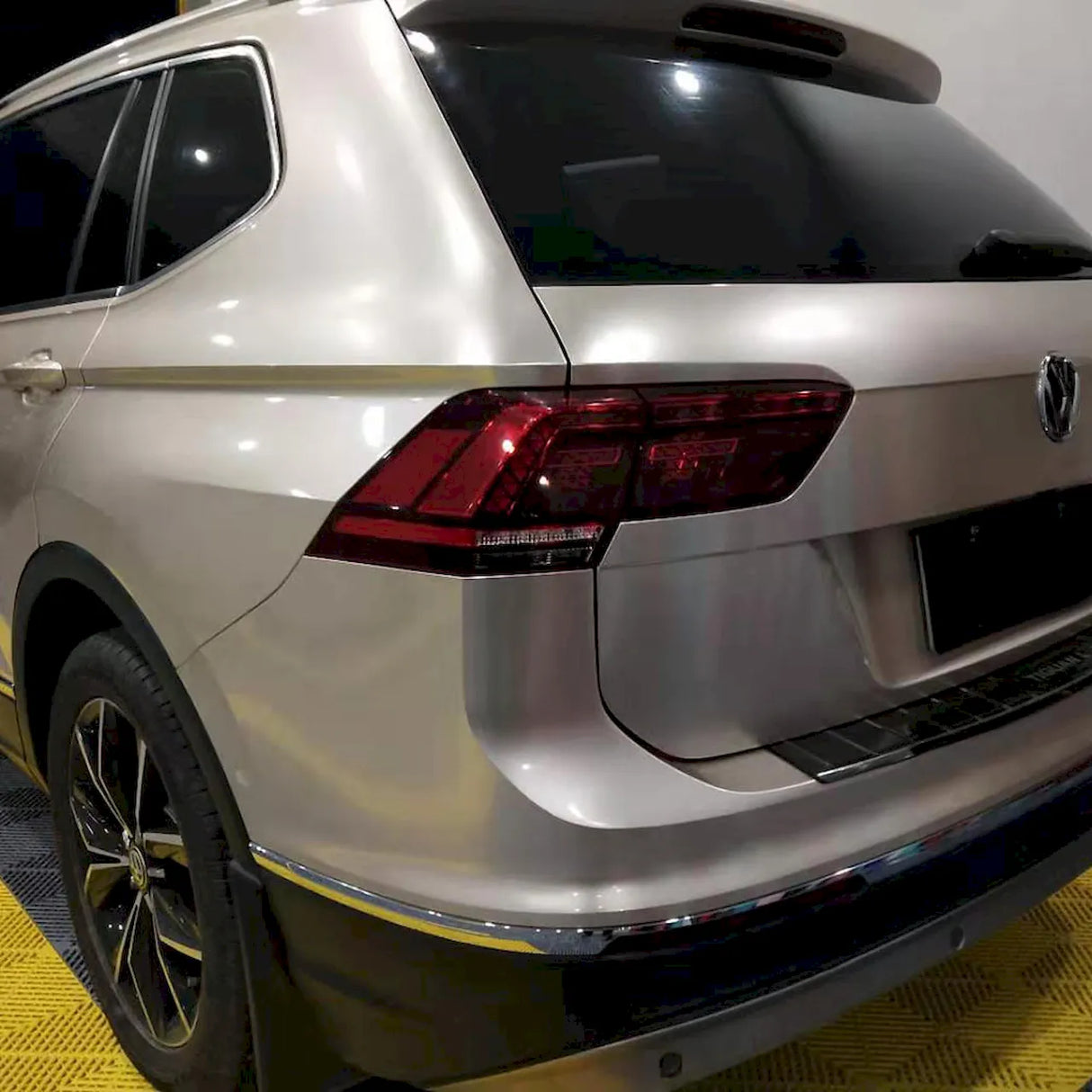 suv wrapped in metallic champaign dark gold car wrap