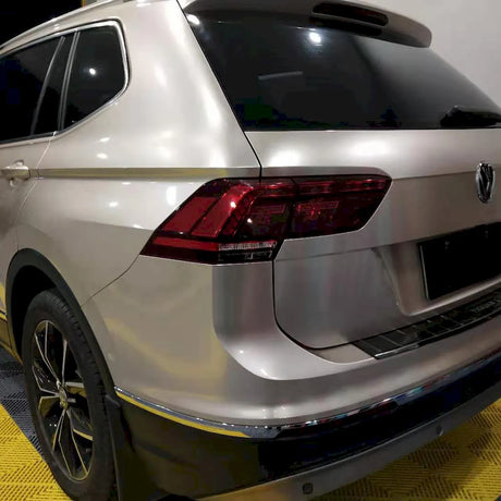 suv wrapped in metallic champaign dark gold car wrap