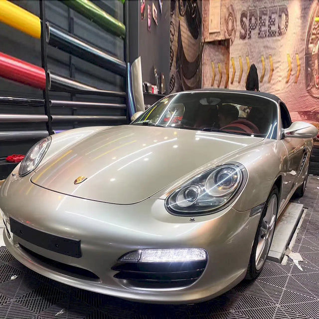 sports car wrapped in metallic champaign dark gold car wrap