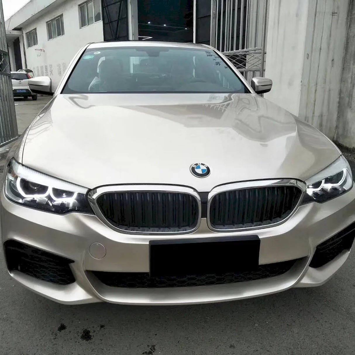 car wrapped in metallic champaign gold car wrap