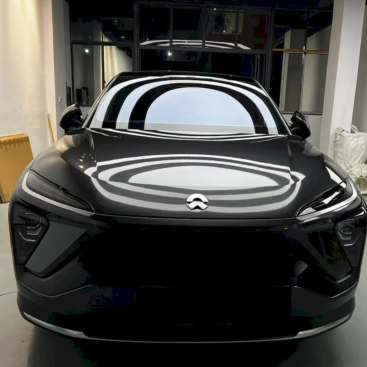 car getting wrapped in metallic coal gray car wrap