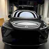 car getting wrapped in metallic coal gray car wrap