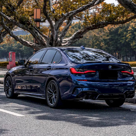 metallic deep blue car wrap installed on a sports car