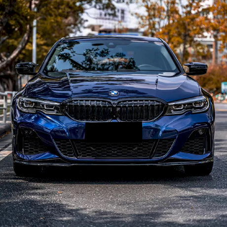 front shot of a car wrapped in metallic deep blue car wrap