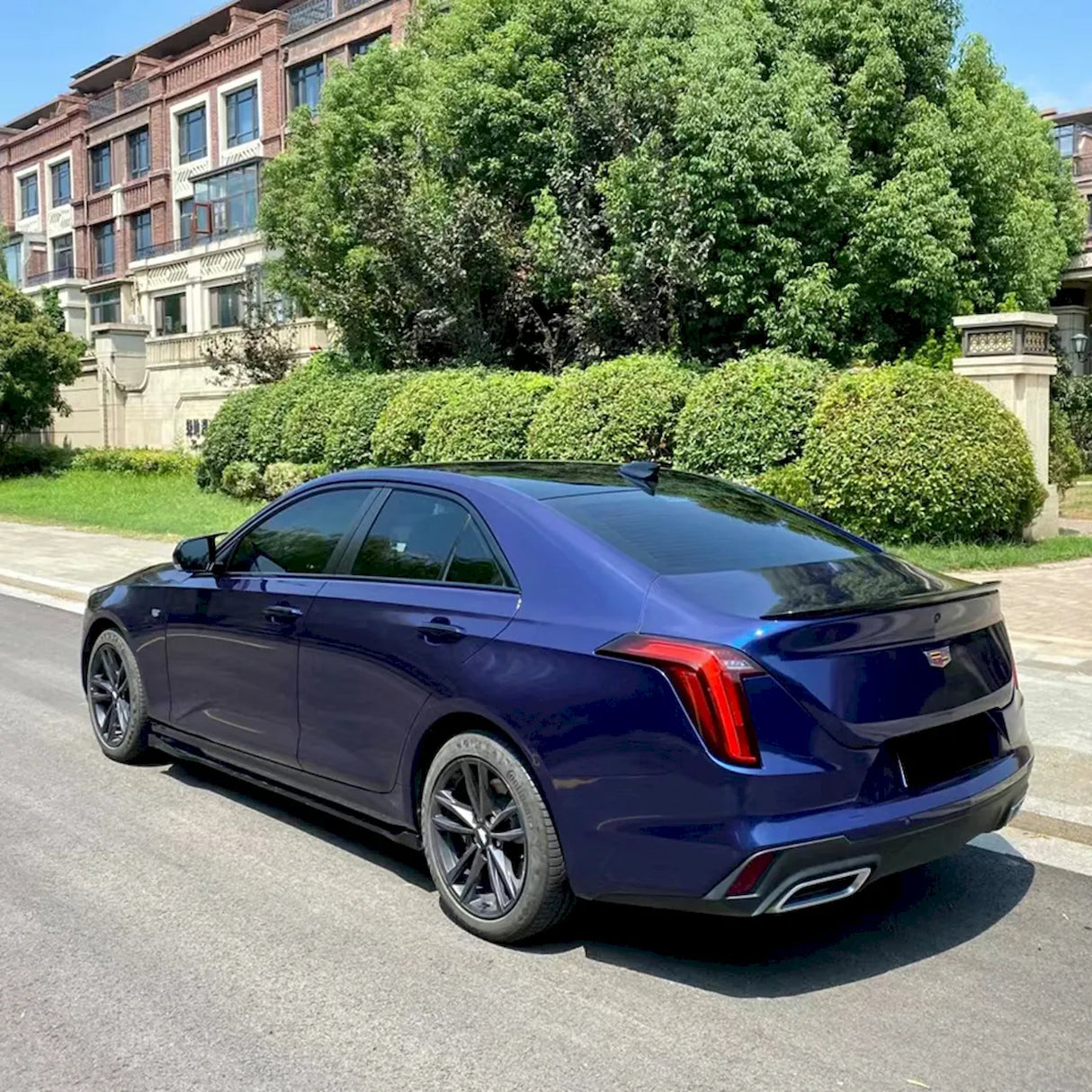 car wrapped in metallic gentian blue vinyl car wrap