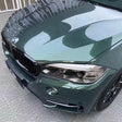 suv wrapped in metallic gothic green vinyl car wrap
