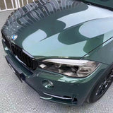 suv wrapped in metallic gothic green vinyl car wrap
