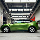 metallic mamba green car wrapping vinyl installed on a hatchback