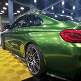 metallic mamba green vehicle wrap on a car