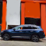 suv wrapped in metallic midnight blue car wrap