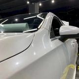 car being wrapped in metallic paint white car wrap