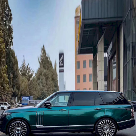 metallic royal green car wrap installed on a suv