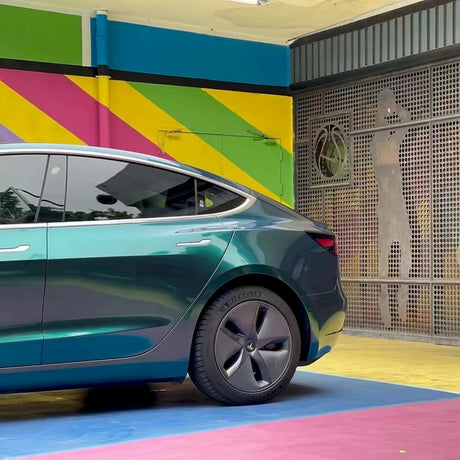 car wrapped in gloss finish metallic royal green car vinyl wrap