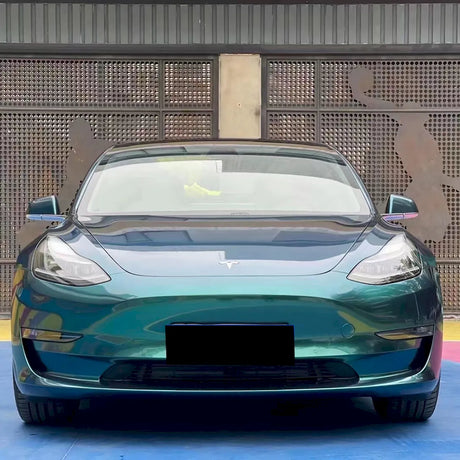 front shot of a vehicle wrapped in metallic royal green gloss car wrap