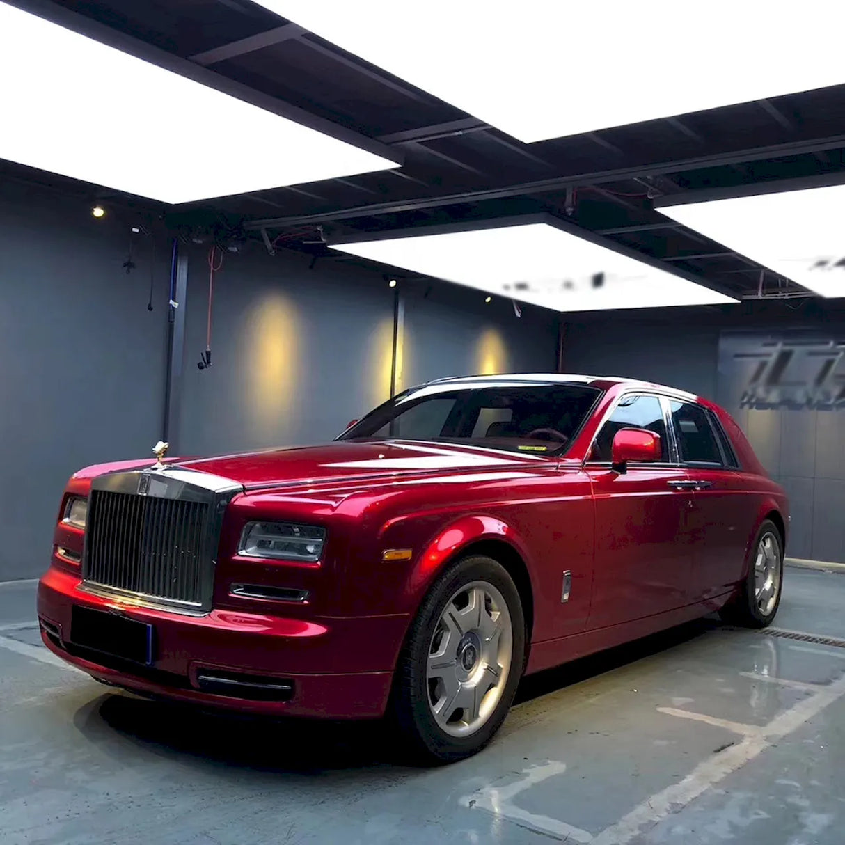 metallic soul red wrap installed on a car