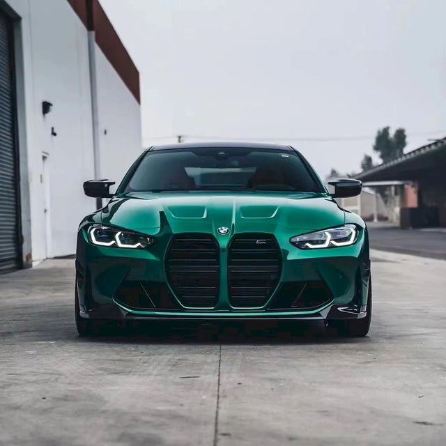 car wrapped in metallic tourist trophy green car wrap