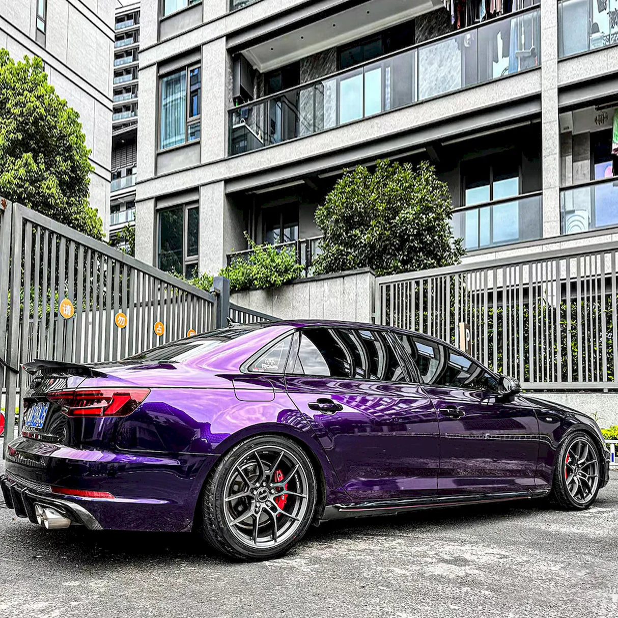 car wrapped with metallic venice purple car wrap