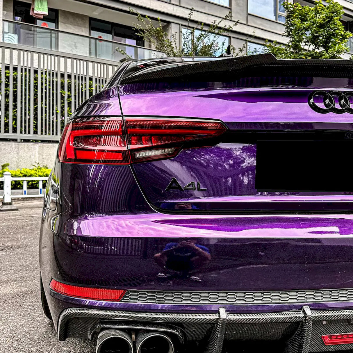 up close look of a car wrapped in metallic venice purple car wrap