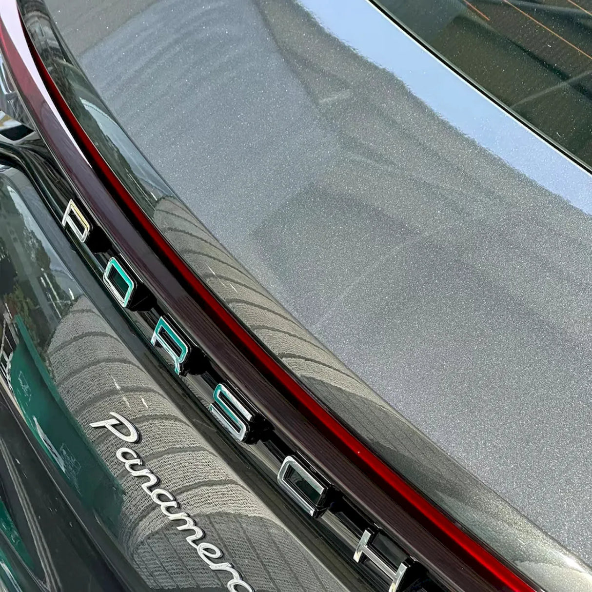 metallic volcano gray car wrap installed on a hatchback