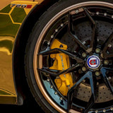close up of paint yellow car wrap on a vehicle