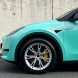 racing aqua green blue car wrap up close shot