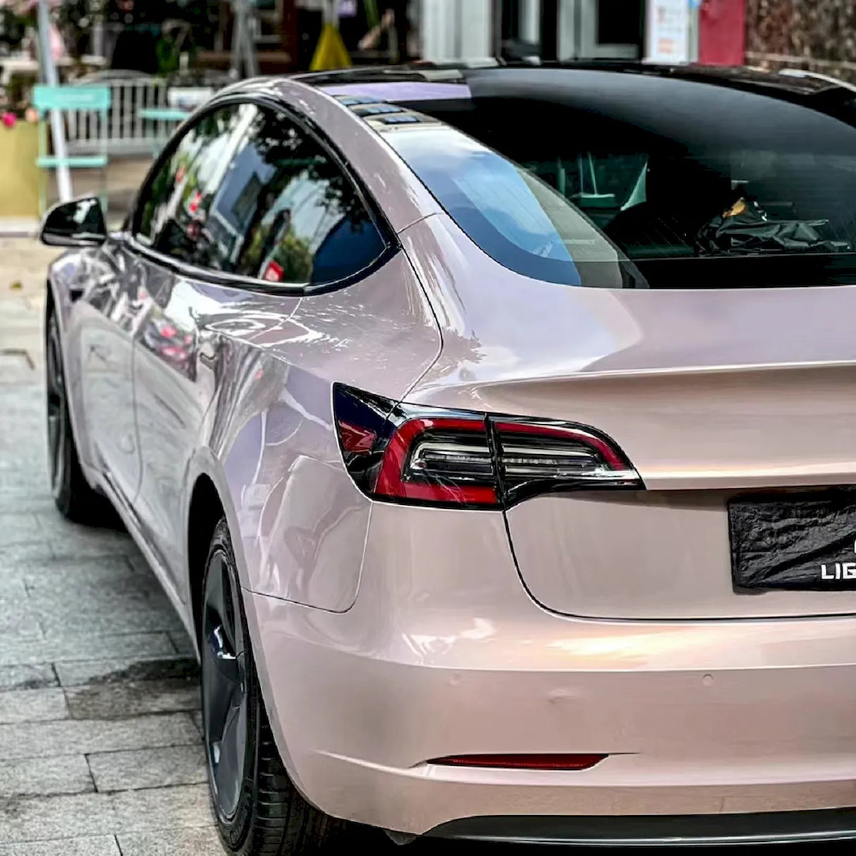 car wrapped in rouge pearl pink vinyl wrap