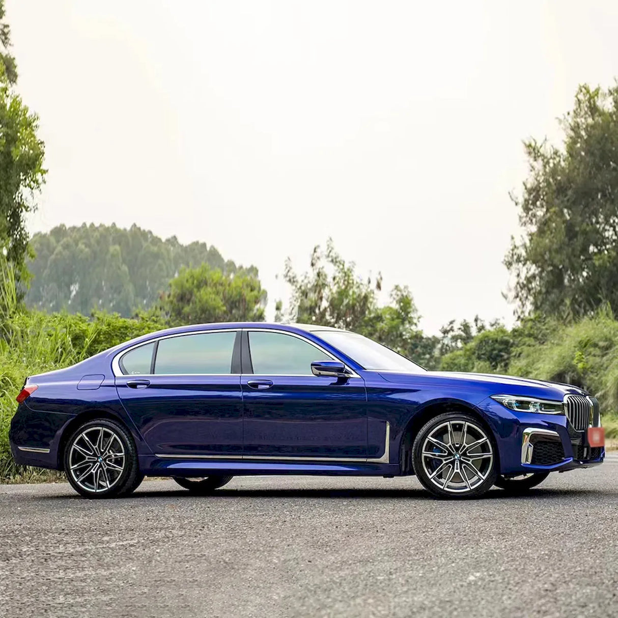 royal indigo blue car wrap installed on a vehicle