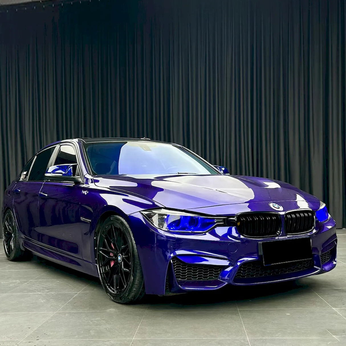 sports car wrapped in royal indigo blue car wrap