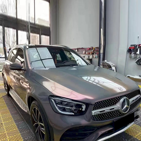 luxury suv being wrapped in stars phantom pink gray vinyl wrap for cars