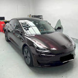 car with tourmalie red car wrap installed
