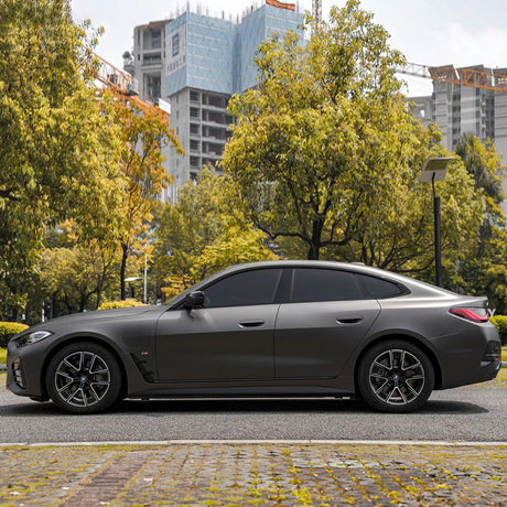 side of a car wrapped in ultimate matte meteorite gray car wrap