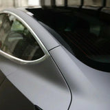 ultra matte dark grey car wrap on a corner of the car