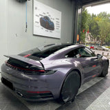 violet gray gloss purple car wrap installed on a sports car